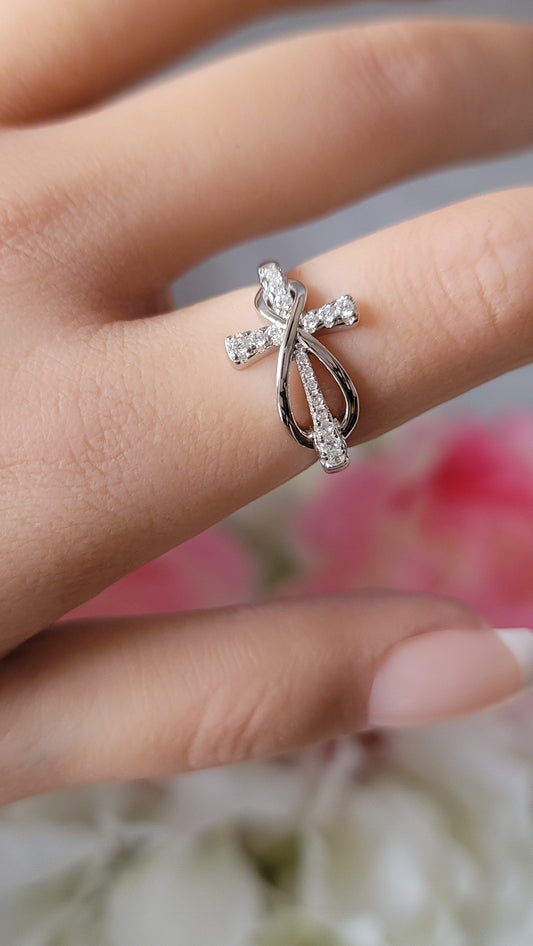 JOY White CZ Diamond Simulant Angel Cross Ring in Rhodium Over Sterling Silver