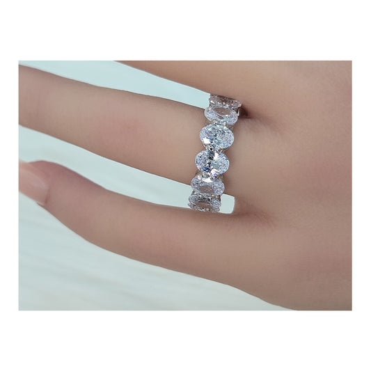 DANAMARIE White CZ Diamond Simulant Oval Cut Eternity Ring in Rhodium Over Sterling Silver