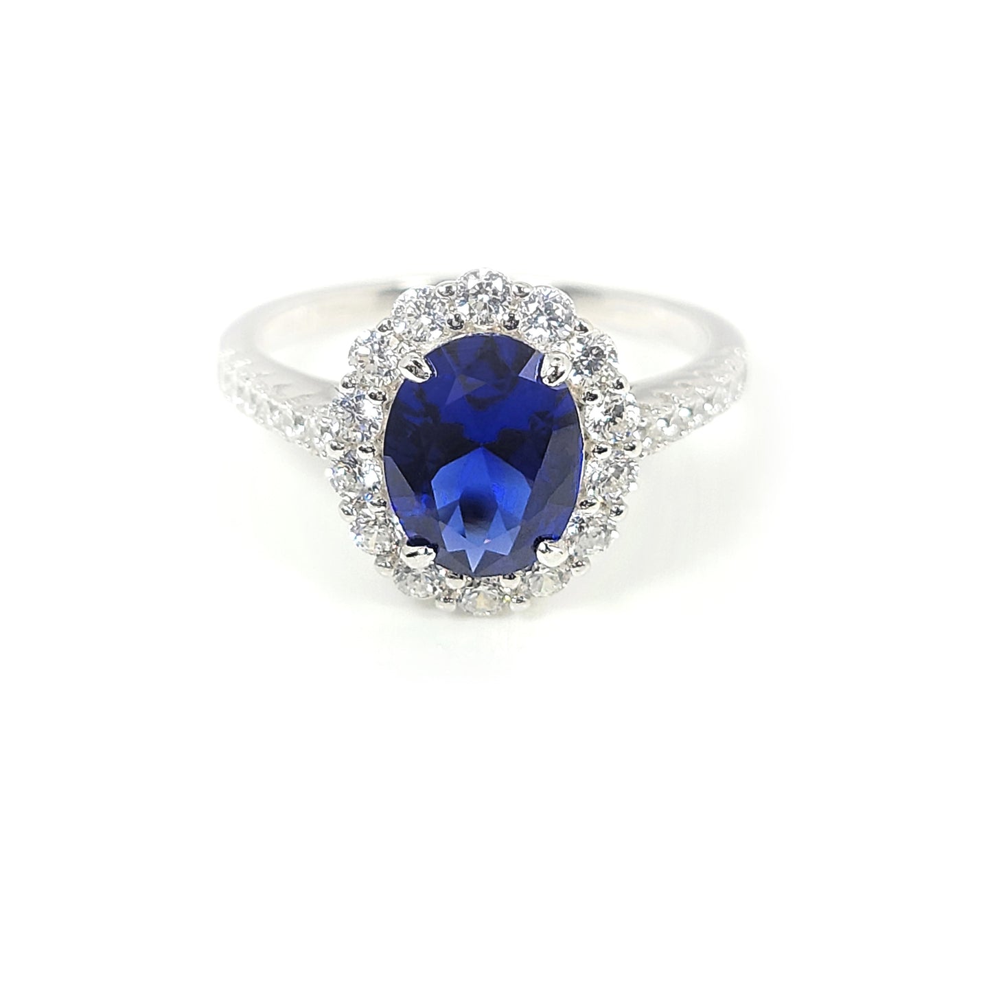 DIANA Oval Blue Sapphire Halo Ring in Rhodium Over Sterling Silver