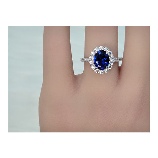 DIANA Oval Blue Sapphire Halo Ring in Rhodium Over Sterling Silver