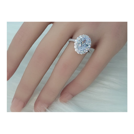 SARA White CZ Diamond Simulant Oval Cut Halo Ring in Rhodium Over Sterling Silver