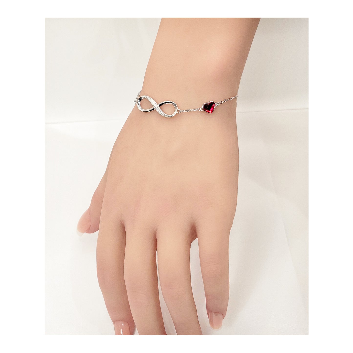 TIFFANY Figure Eight Austrian Red Crystal Heart Bracelet in Rhodium Over Sterling Silver