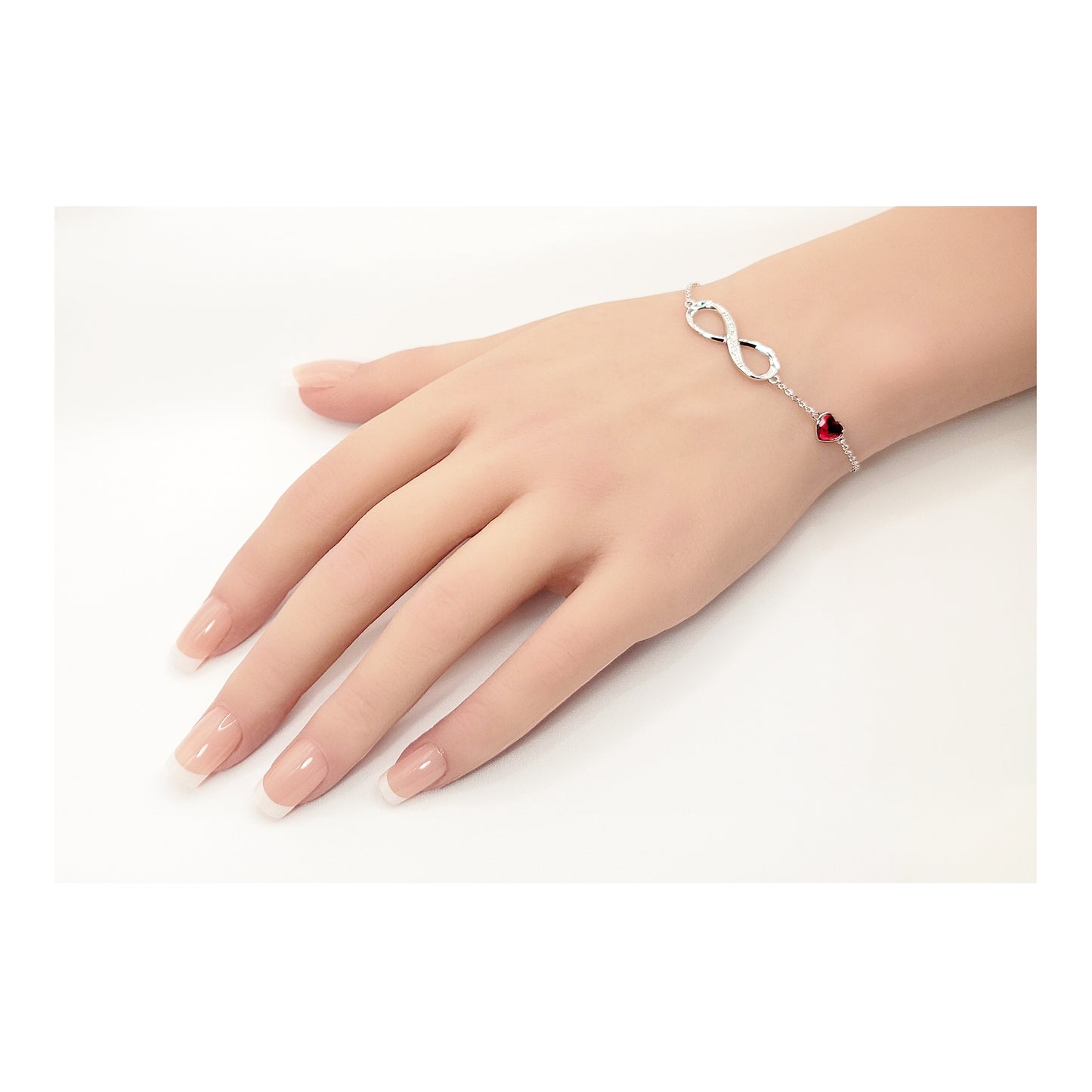 TIFFANY Figure Eight Austrian Red Crystal Heart Bracelet in Rhodium Over Sterling Silver