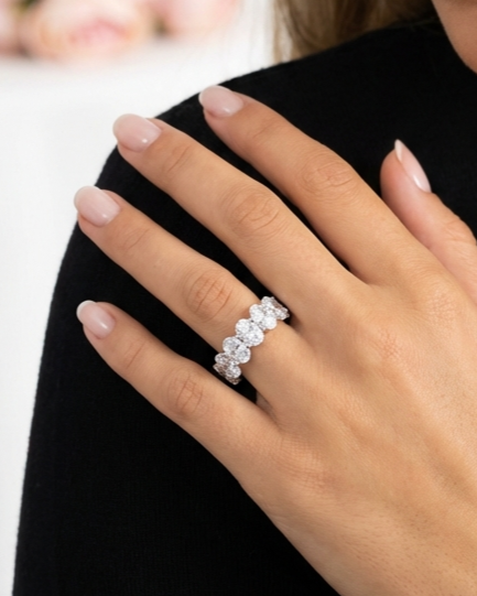 DANAMARIE White CZ Diamond Oval Cut Eternity Ring in Rhodium Over Sterling Silver