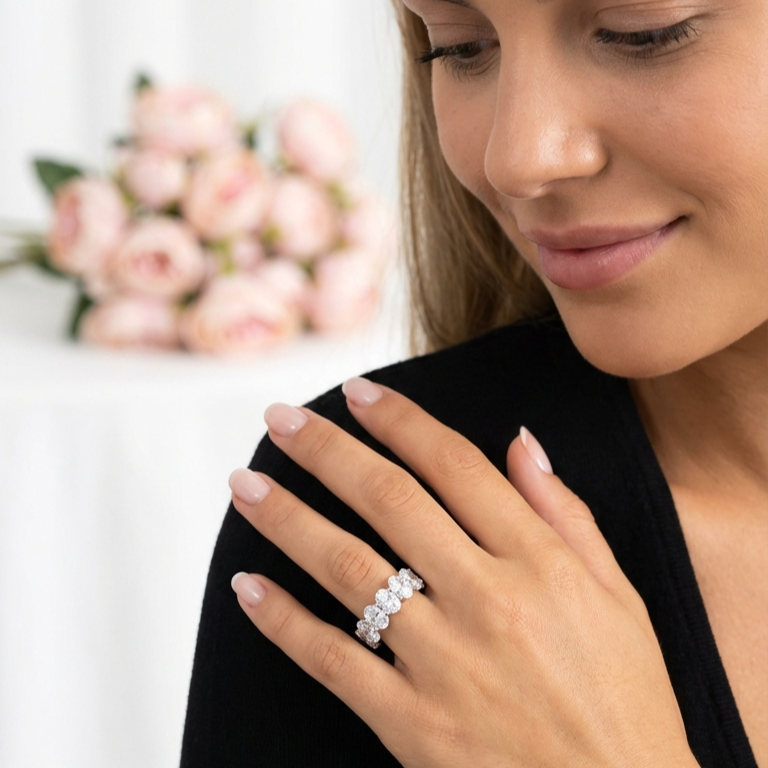 DANAMARIE White CZ Diamond Oval Cut Eternity Ring in Rhodium Over Sterling Silver