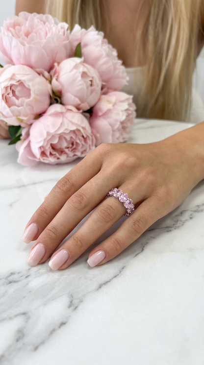 DANAMARIE Pink Oval Cut Eternity Ring in Rhodium Over Sterling Silver