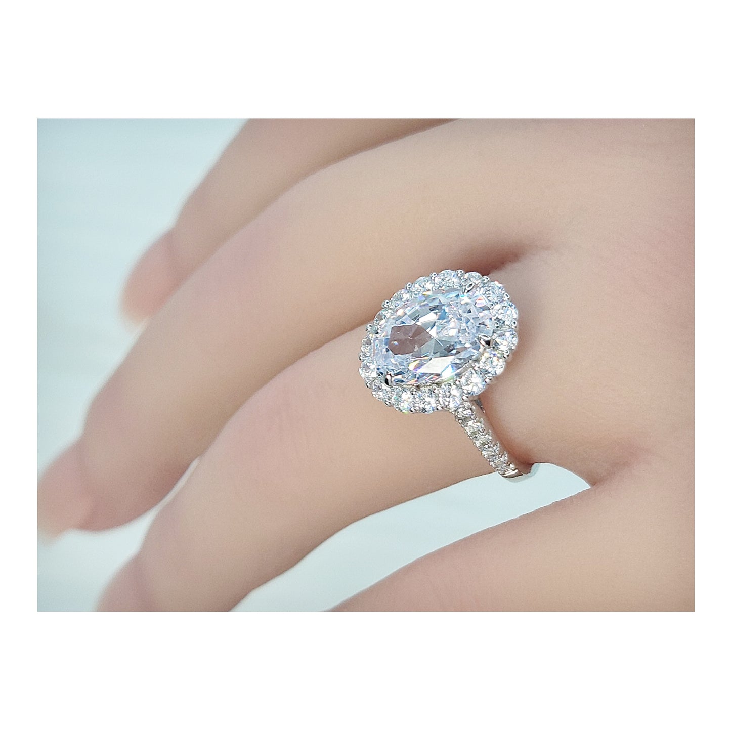 SARA Oval Cut Halo Ring in Sterling Silver