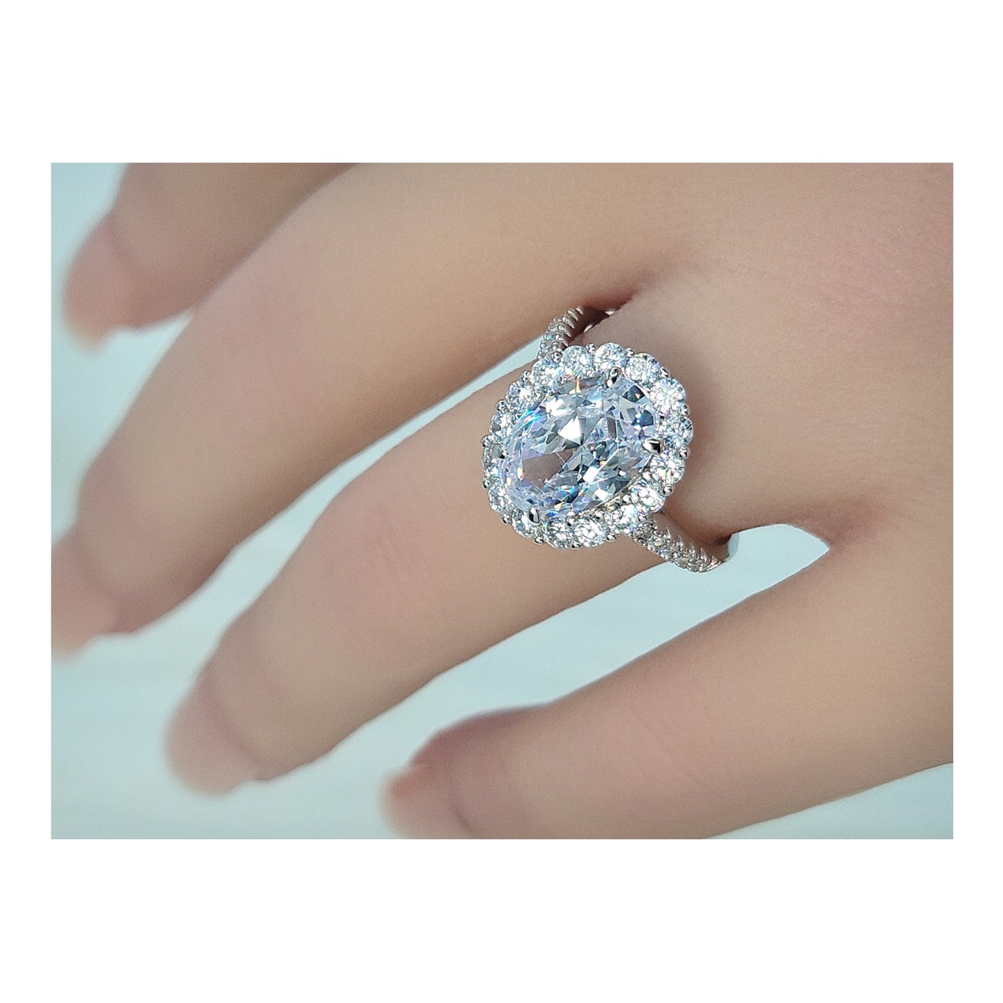 SARA Oval Cut Halo Ring in Sterling Silver