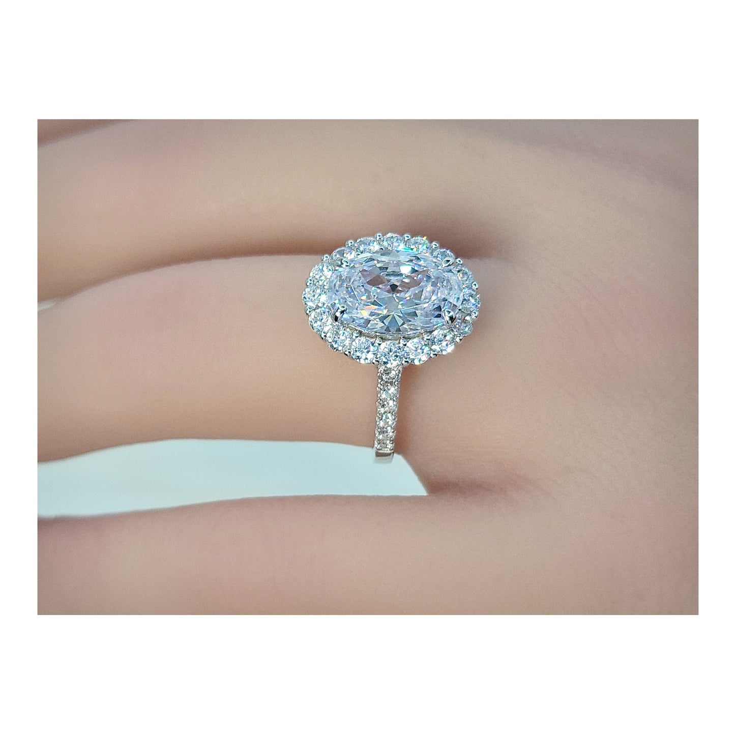 SARA Oval Cut Halo Ring in Sterling Silver