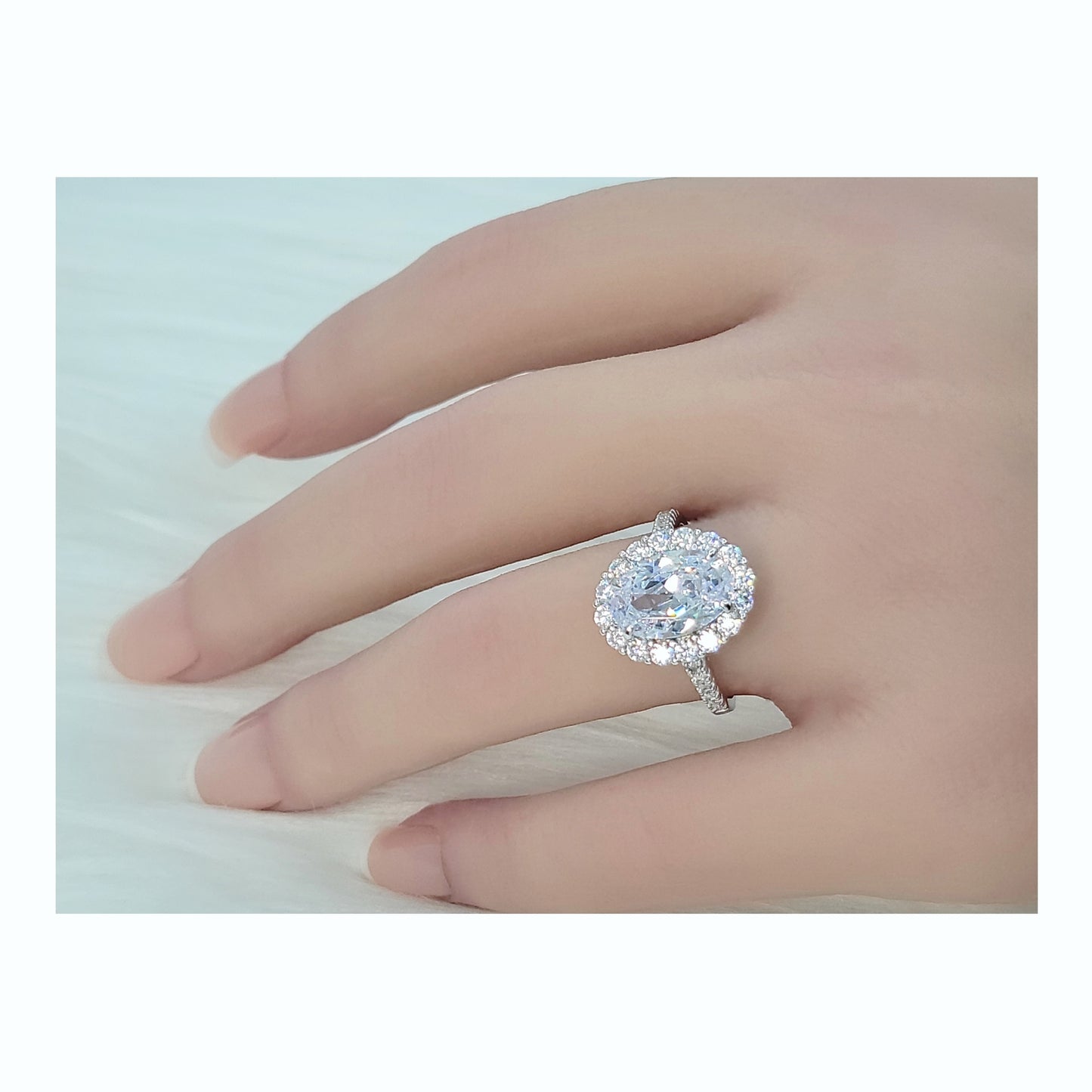 SARA Oval Cut Halo Ring in Sterling Silver