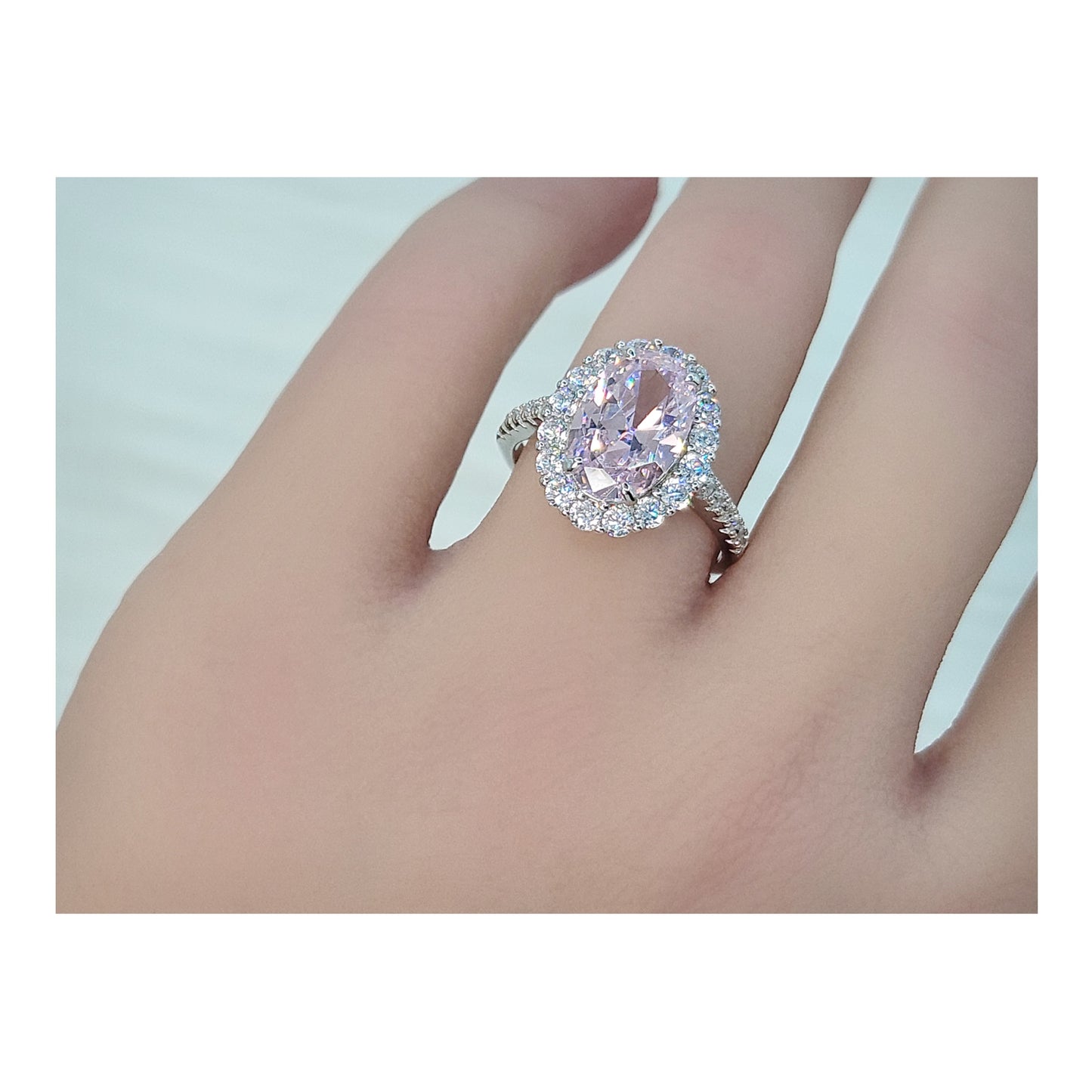 SARA Pink Oval Cut Halo Ring in Sterling Silver