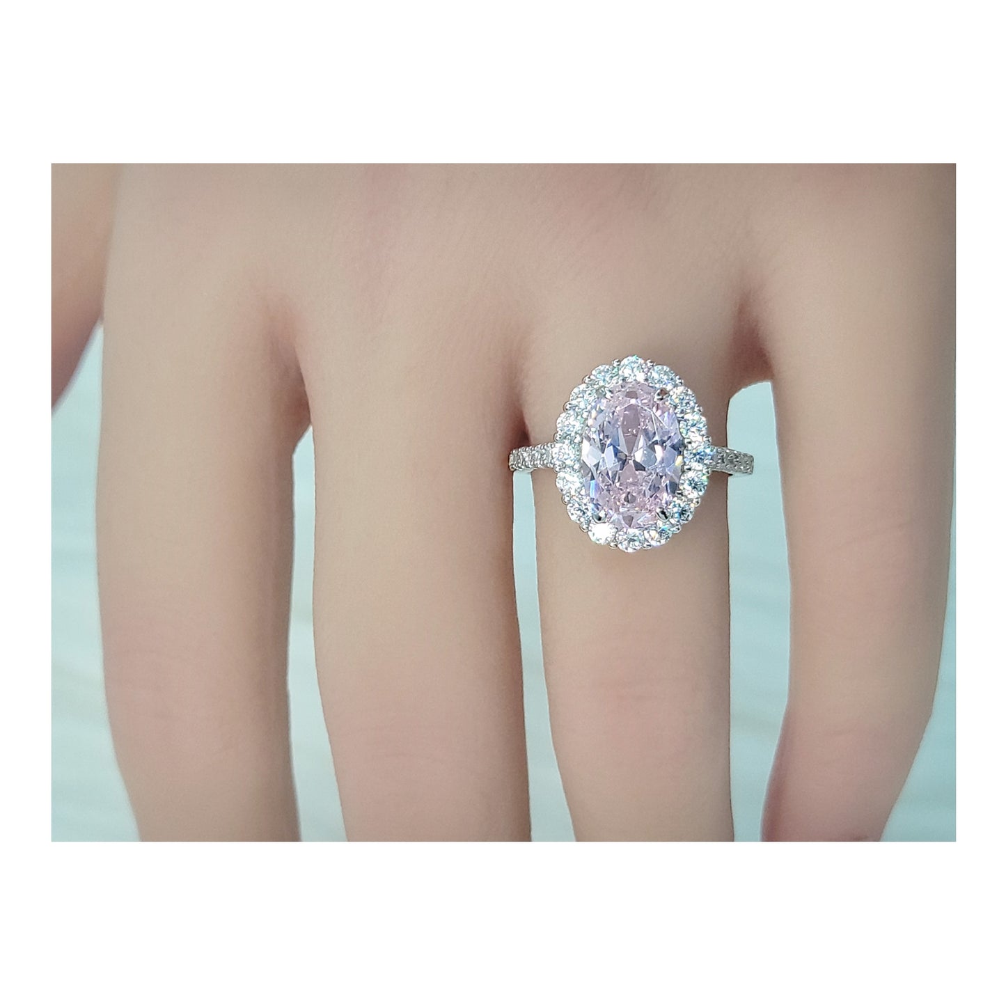 SARA Pink Oval Cut Halo Ring in Sterling Silver