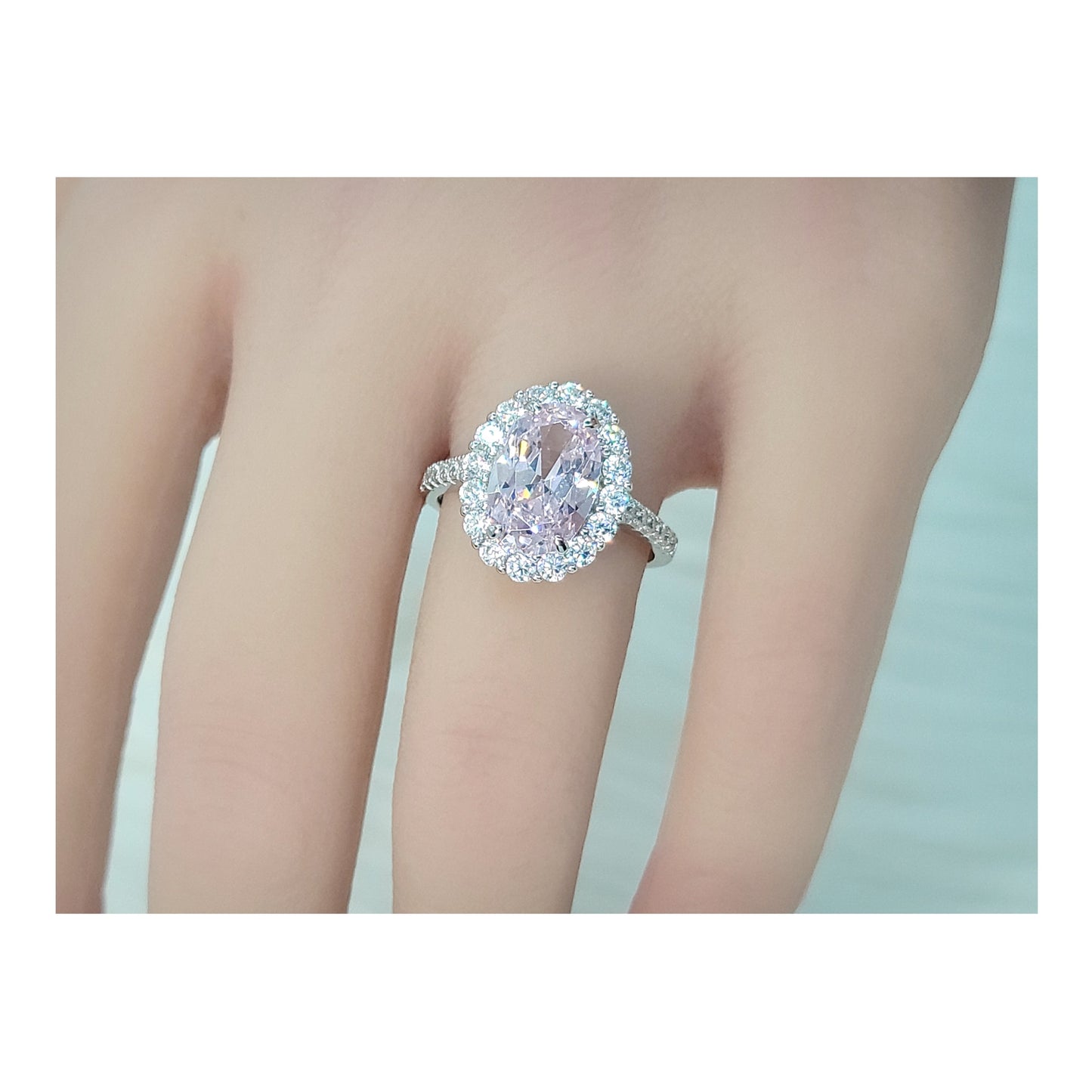 SARA Pink Oval Cut Halo Ring in Sterling Silver