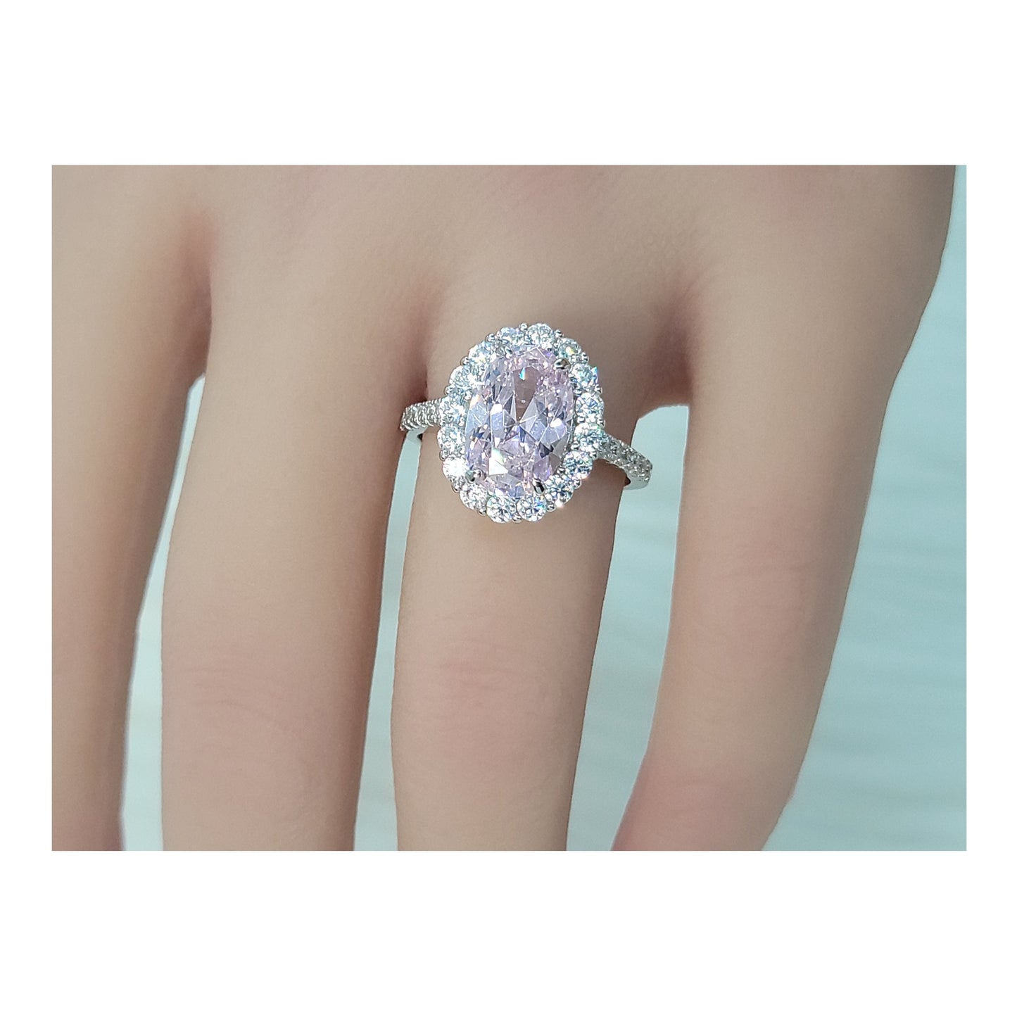 SARA Pink Oval Cut Halo Ring in Sterling Silver