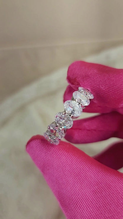 DANAMARIE White CZ Diamond Oval Cut Eternity Ring in Rhodium Over Sterling Silver